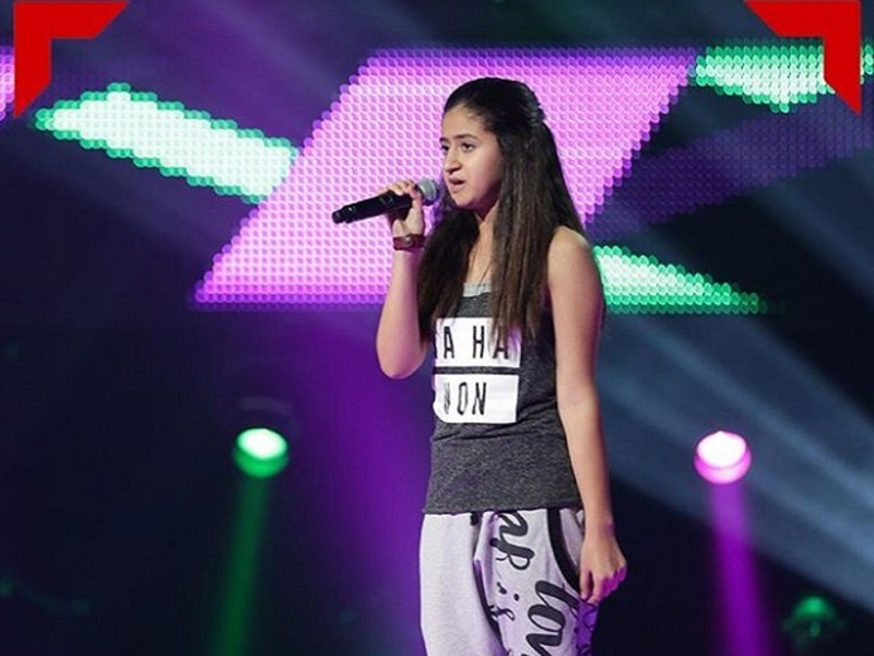 صور تامر حسني يغازل حفصة ذكري في The Voice Kids فكيف كان رد فعلها؟